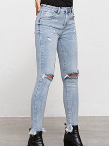 Mid Rise Distressed Skinny Jeans